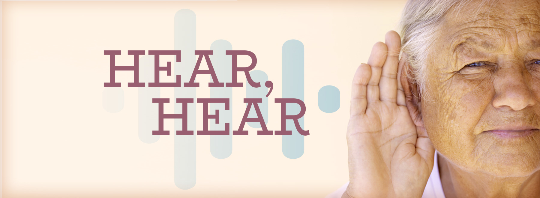 Older ethnic man using his hand to hear